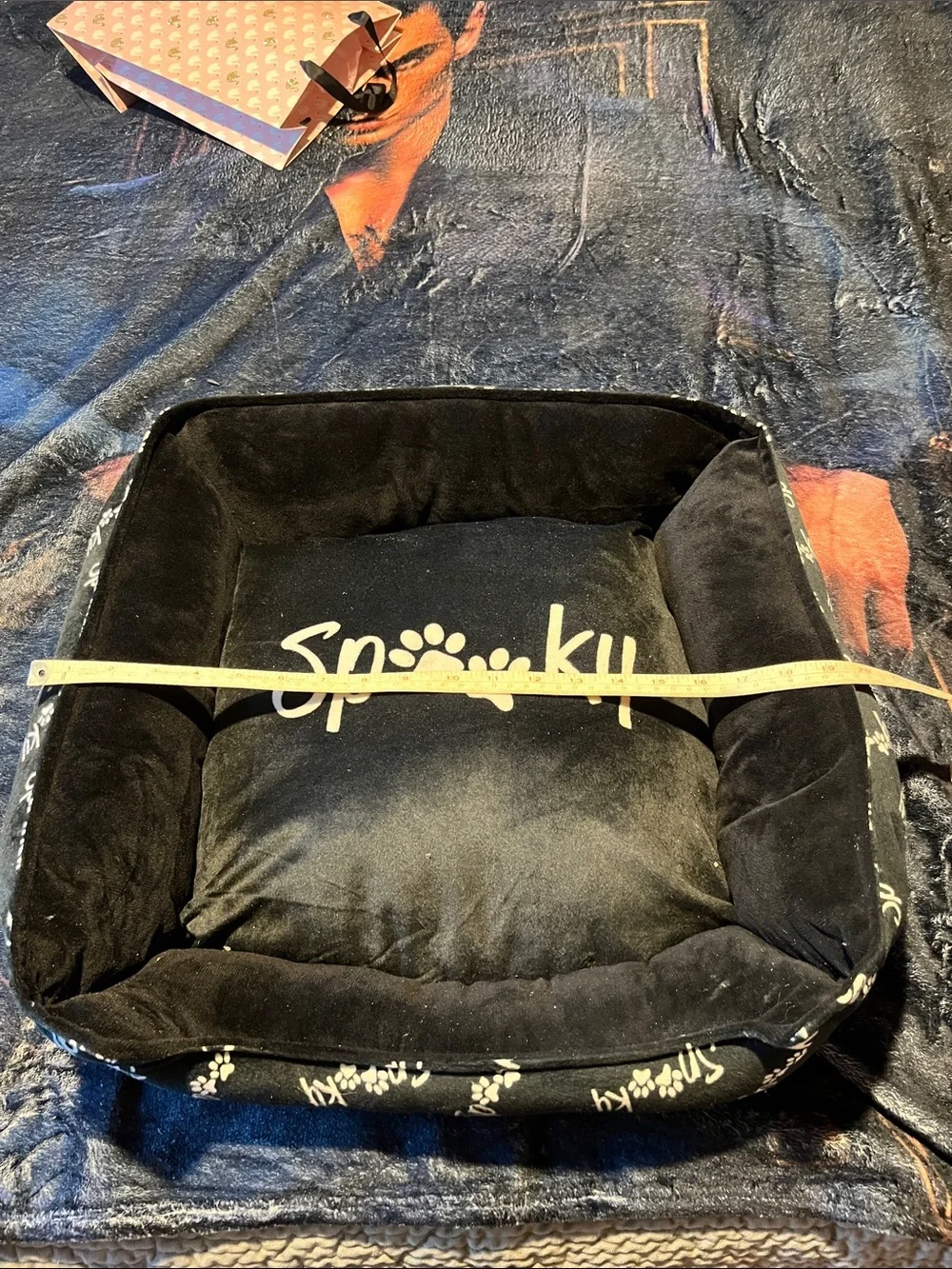 Plush Black Dog Bed with Paw-Print Accent